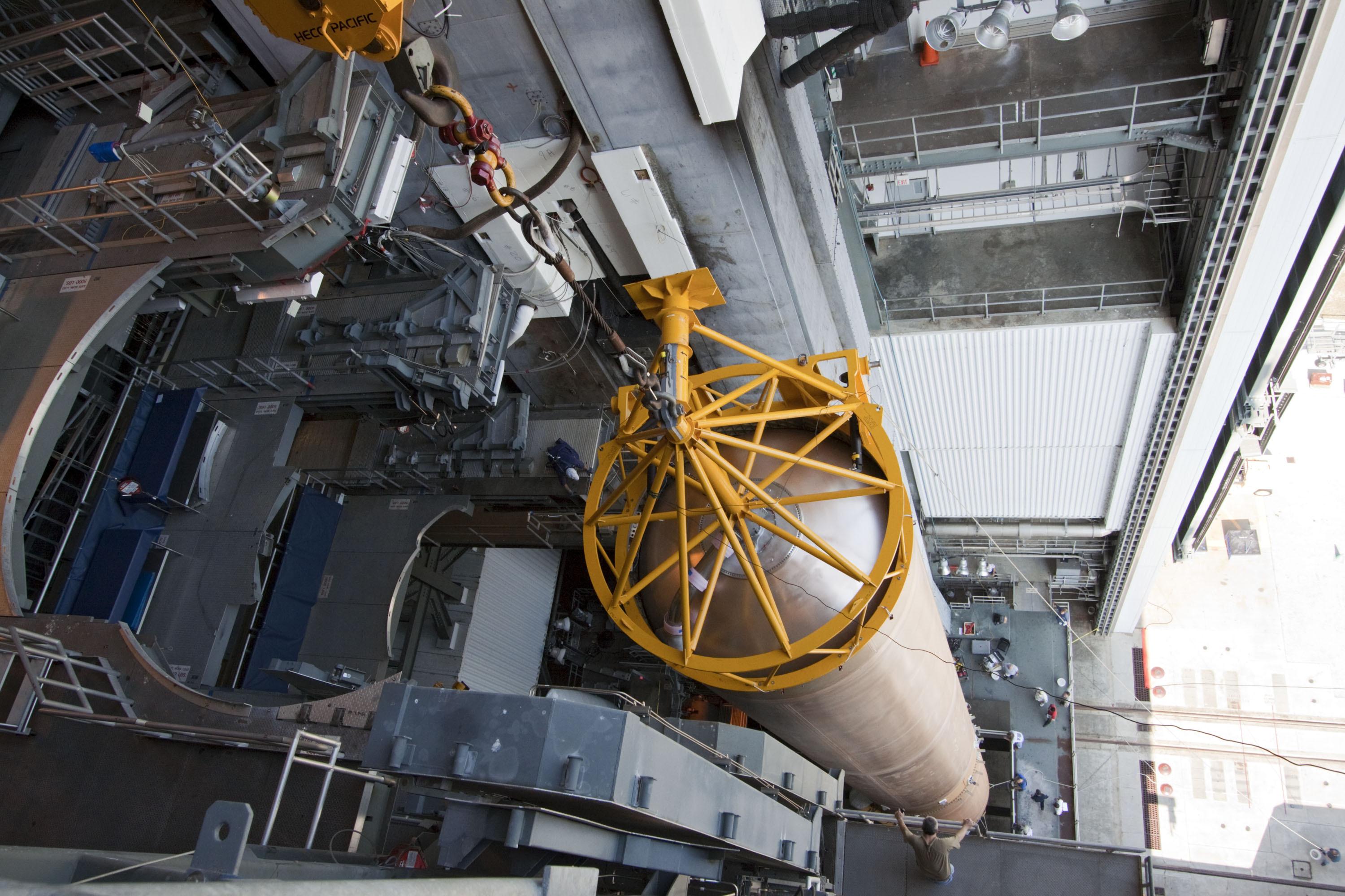 Rocket fuel tank suspended from crane