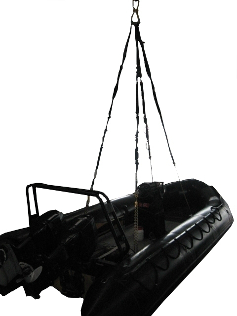 Inflatable speedboat with 4 chains ready for rapid transport under a helicopter